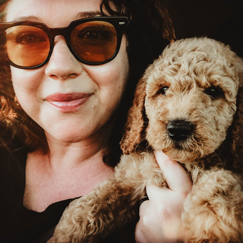 Desiree selfie with a puppy